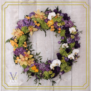 Tribute wreath in yellow, purple and green