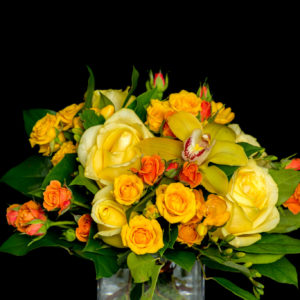 Bright yellow and orange bouquet in vase