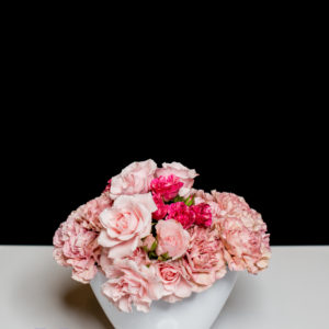 Carnation and spray rose mounded design